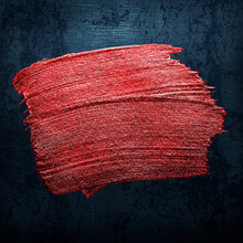 Metallic Red Oil Paint Brush Stroke Texture On A Black Background
