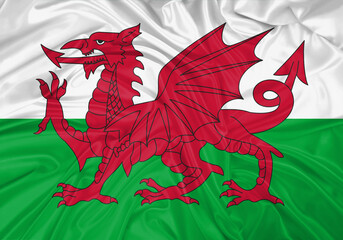 Wall Mural - Wales national flag texture. Background for international concept. Simple waving flag.