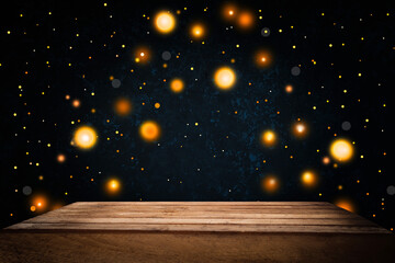 Golden abstract bokeh background on blur dark background