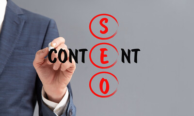 Poster - Man Writing Keywords Seo And Content Over Gray Background, Cropped