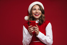 Happy Young Woman In Christmas Santa Hat