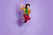 © deagreez - Photo portrait full body view of guy shouting singing into mic jumping up isolated on vivid purple colored background