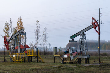 Russian oil pumpers in the fog