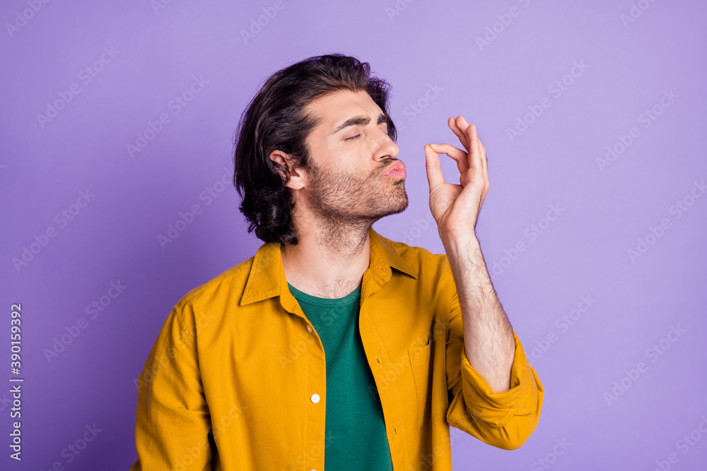 Photo of attractive young arabian man pout lips show belissimo perfect sign isolated over violet color background