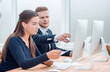 © ASDF - close up. young employees discussing online information