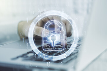 Poster - Double exposure of creative lock hologram with chip and hands typing on laptop on background. Information security concept