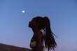 © Lucas Ottone/Stocksy - African woman and the moon