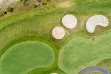 Aerial Top Down Views Of Golf Course Greens, Bunkers And Fairway