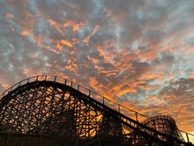 Rollercoaster At Sunset At Six Flags