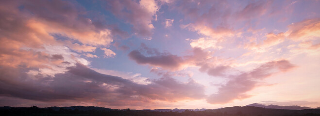 Wall Mural - world environment day concept: sky and clouds autumn sunset mountain background