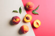 © New Africa - Fresh ripe peaches and green leaves on color background, flat lay