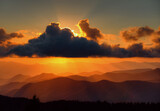 Fototapeta Zachód słońca - A golden sunset of the Blue Ridge mountains off of the Blue Ridge Parkway in North Carolina, USA.