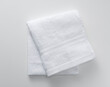 A towel placed on a white background. View from above