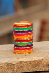 multi color bangle put on a stone