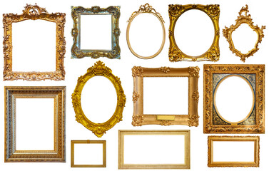 assortment of golden and silvery art and photo frames isolated on white background