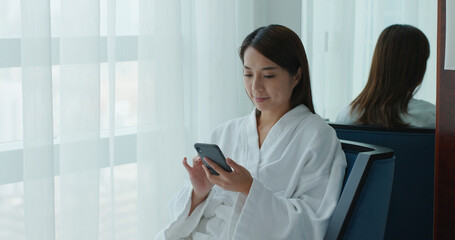 Sticker - Woman use of tablet computer at hotel room