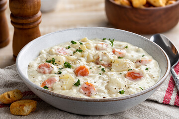 Wall Mural - Bowl of Potato and Carrot Soup