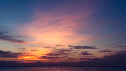 Wall Mural - sunset sky background over the sea in the evening ,dusk sky twilight