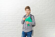 © yana_novak22 - Cool teenage schoolboy on white background