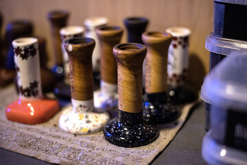 Hookah bowls drying on the towel in a restaurant