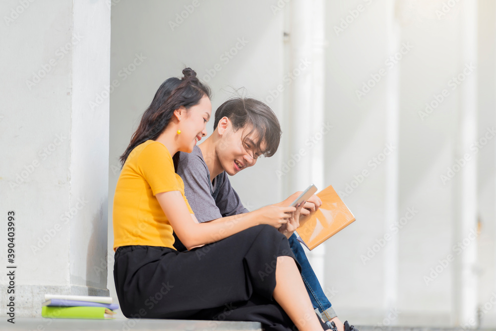 Group of Young asian students studying together. Asian students using ...