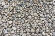 Seamless rough stone gravel texture background.