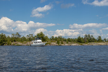 Wall Mural - Trawler boat anchored at the Bad River in Georgian Bay, Ontario, Canada