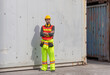 © JU.STOCKER - Engineer man in hard hat standing with arms crossed at container cargo