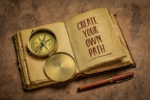 Create Your Own Path - Handwriting In An Antique Leather-bound Journal With A Stylish Pen And Vintage Brass Compass, Lifestyle, Career And Personal Development Concept