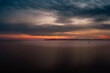 © KARUPPASAMY - cloudy sunset over the river