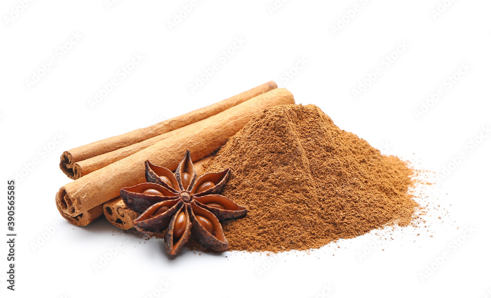 Cinnamon sticks, powder and anise on white background