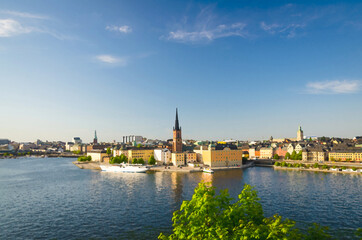 Sticker - Watercolor drawing of Aerial panoramic top view of Riddarholmen district with Riddarholm Church and typical sweden gothic buildings, boat ship sailing on water of Lake Malaren in Stockholm, Sweden