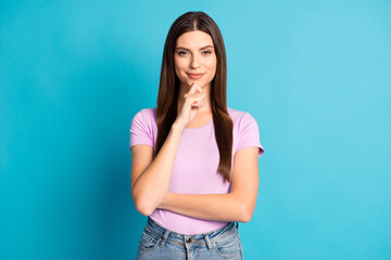 Sticker - Photo portrait of attractive charming woman wear casual violet t-shirt denim trousers arm finger chin isolated blue color background