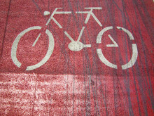 Intensive Red Cycle Path And White Bicycle On.