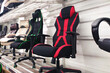 Different computer gamer soft ergonomic chairs in the furniture store.