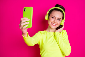 Sticker - Close-up portrait of her she nice attractive pretty lovely cheerful glad girl listening music melody taking making selfie enjoying isolated bright vivid shine vibrant pink fuchsia color background