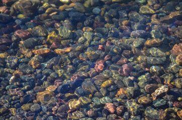 top view shot clear river water stones as a background