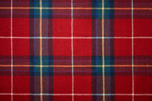 Red Tartan Plaid Material Background. Christmas Pattern.