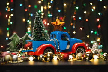 Wall Mural - new year or christmas composition with christmas balls and a car toy