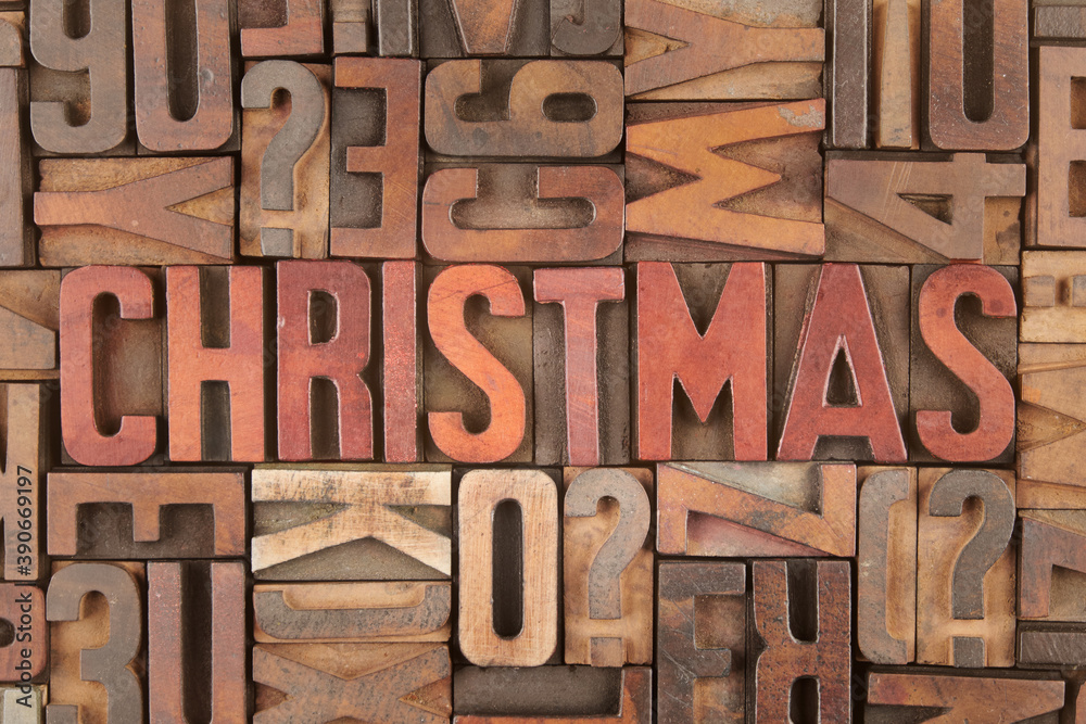 Christmas word in vintage letterpress wooden blocks - obrazy, fototapety, plakaty 