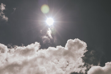 Wall Mural - sunbeam blue sky. bright midday sun ray illuminates the space for overlay nature background