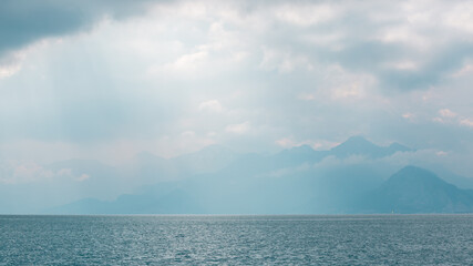 Wall Mural - Morning in foggy mountains near sea. Mountain landscape