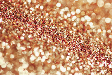 background with Golden glitter texture. glitter macro. festive background with a shiny glitter texture.