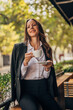 © eastwest photo - business woman enjoying her coffee