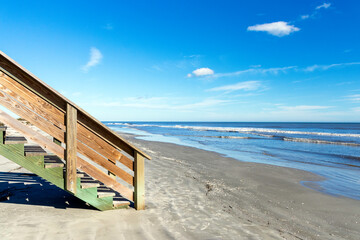 Beach and shoreline concept of rising sea levels as a consequence of climate changes.