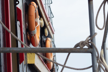 Sticker - Orange round lifebuoys on the ship