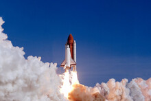 The Launch Of The Space Shuttle Against The Background Of The Sky And Smoke. Elements Of This Image Furnished By NASA