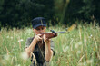 © SHOTPRIME STUDIO - Woman soldier Shelter in the grass hunting weapon green leaves
