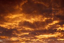 Colorful Dramatic Sky With Orange Clouds At Sunset