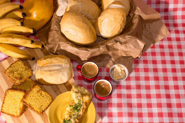 colonial breakfast típic from south of brazil, with many types food,cake,cookie,omelet and fruits...